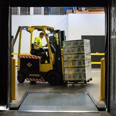 Fork lift into truck